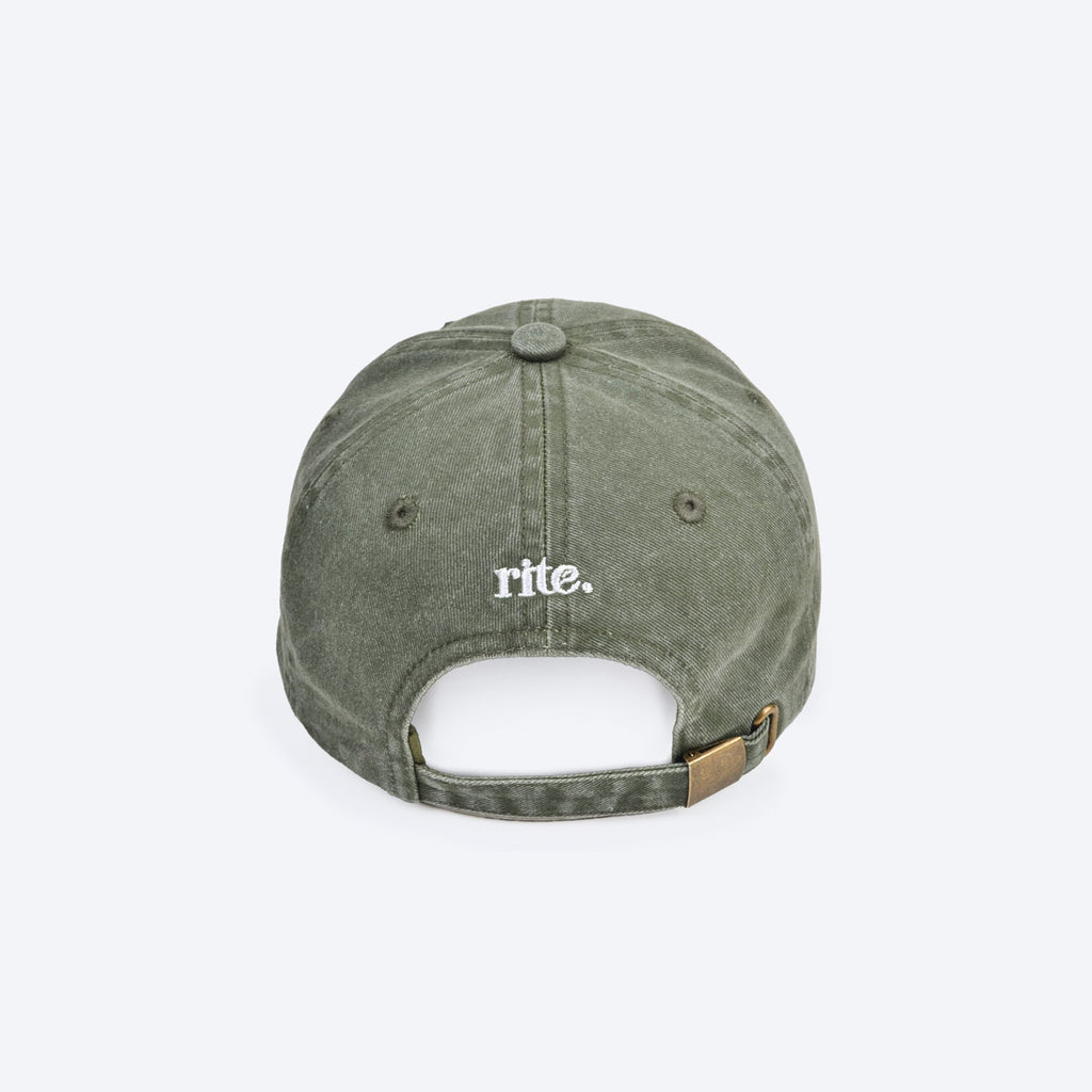 GREEN CAP with white embroidered rite. logo, curved brim, and soft washed fabric for casual wear
