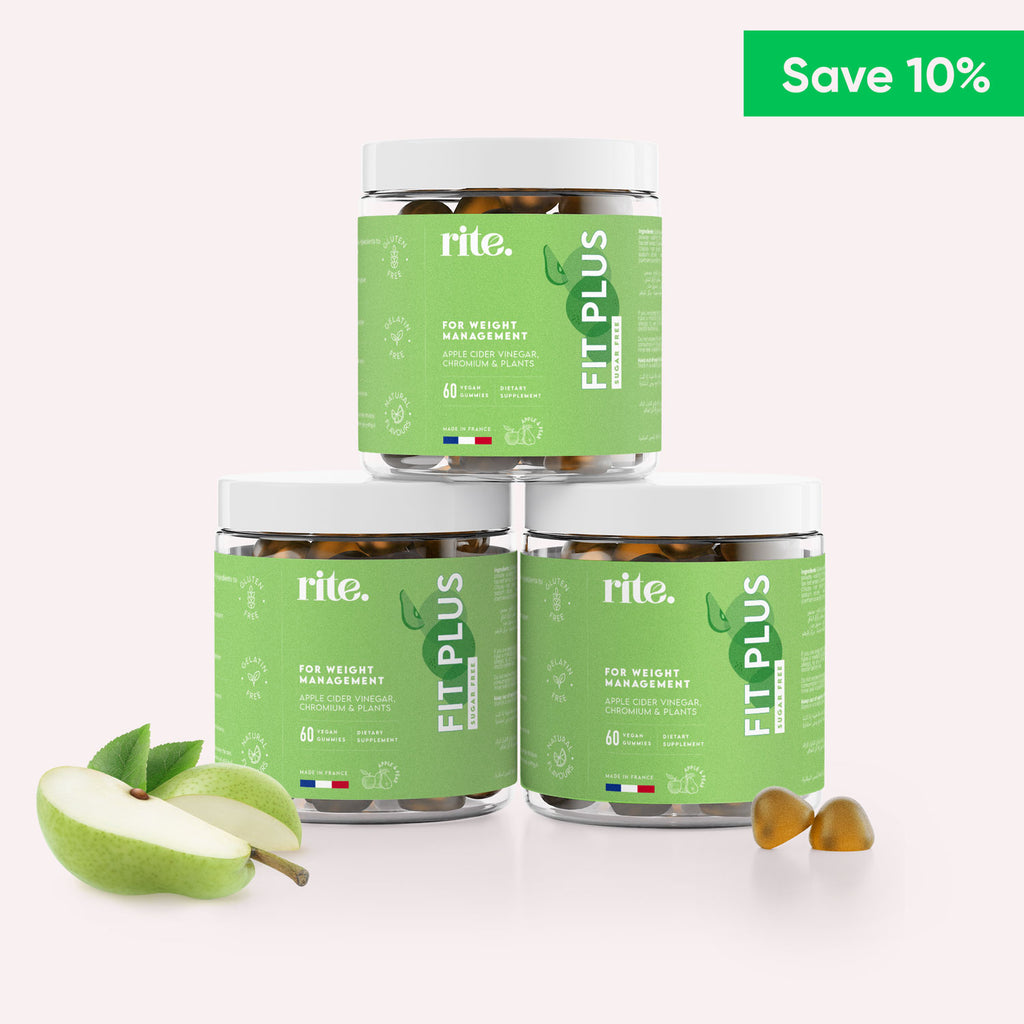 Three jars of rite fit plus gummy vitamins in a row with an apple  in front of them. .