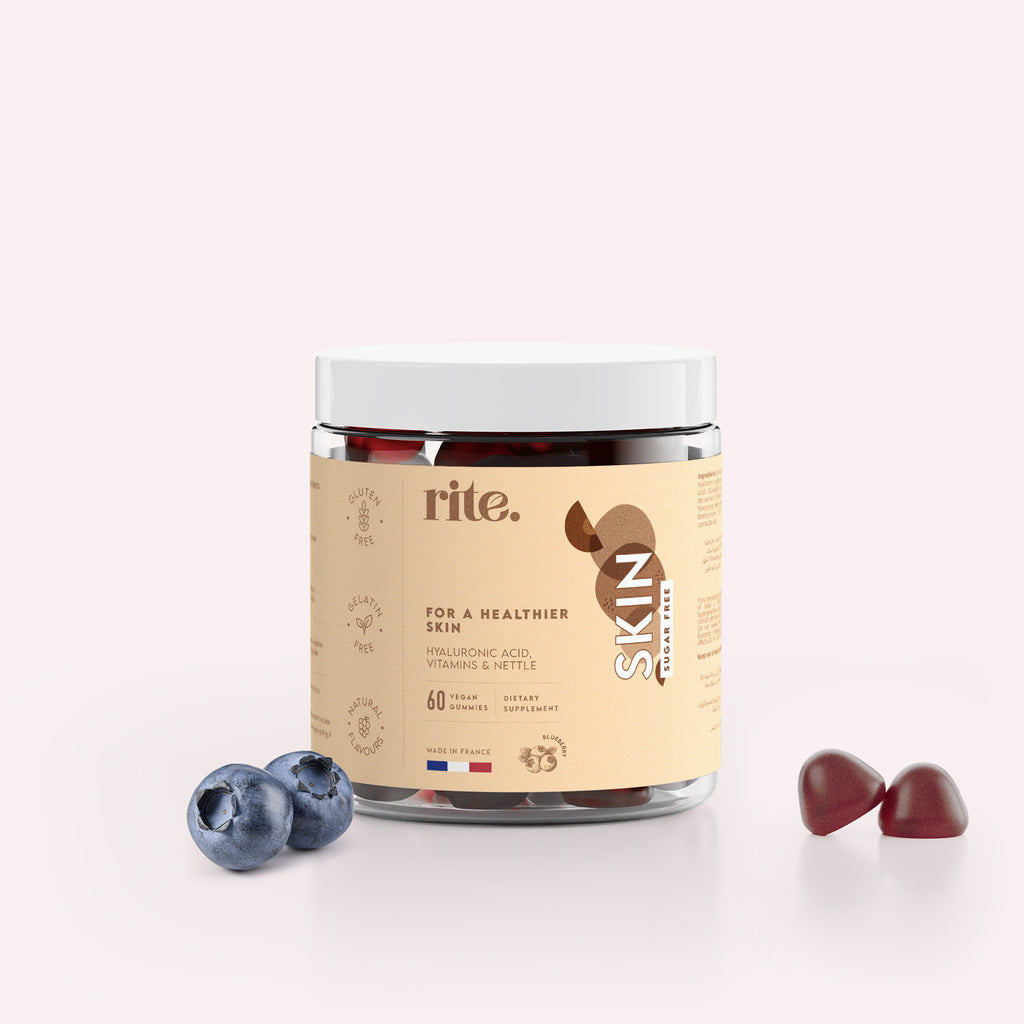 SKIN GUMMIES jar with blueberries and two gummies beside it; highlights include hyaluronic acid, vitamins, and nettle for healthy skin