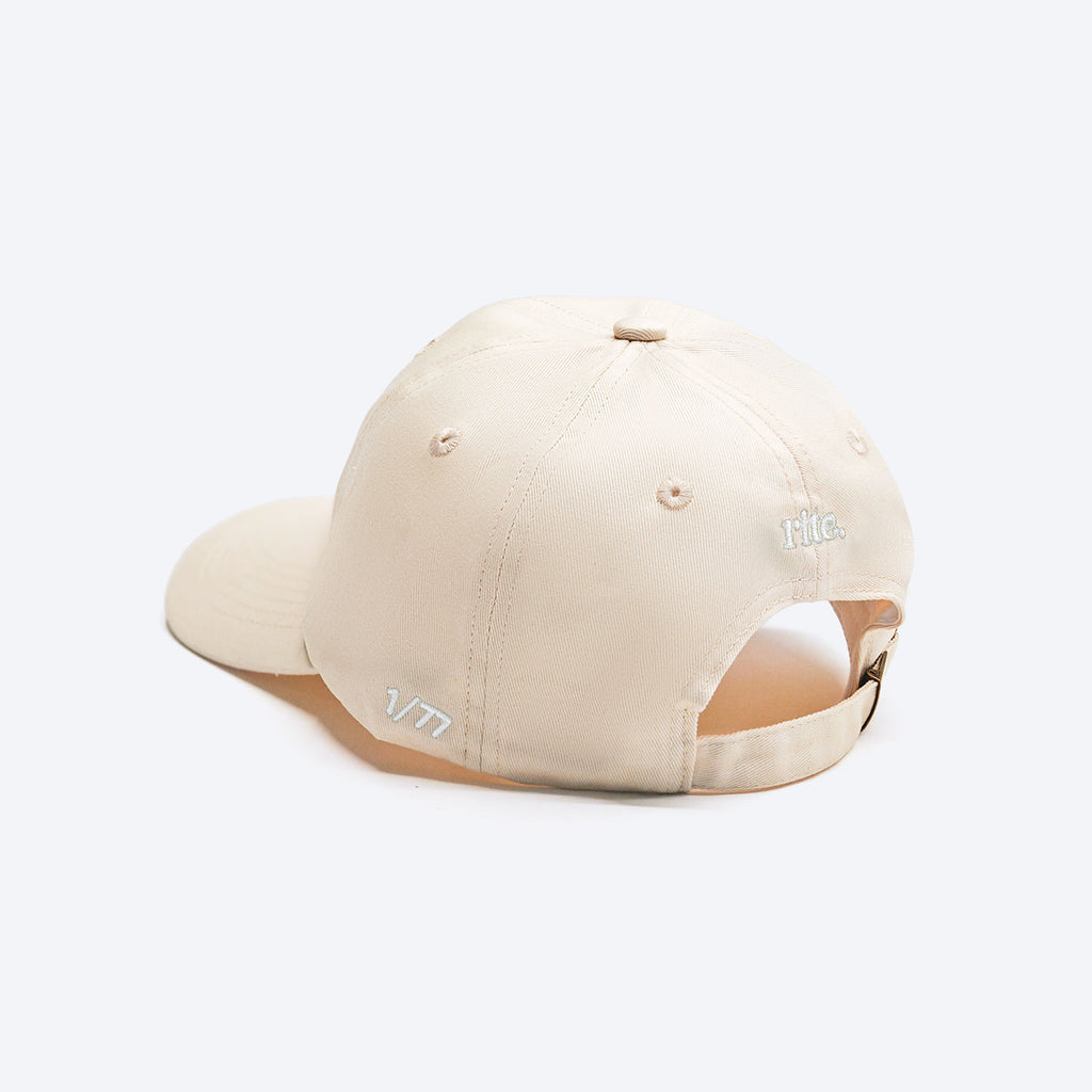 WHITE RITE CAP, soft cotton build with subtle embroidered branding—perfect for daily wear and effortless style.