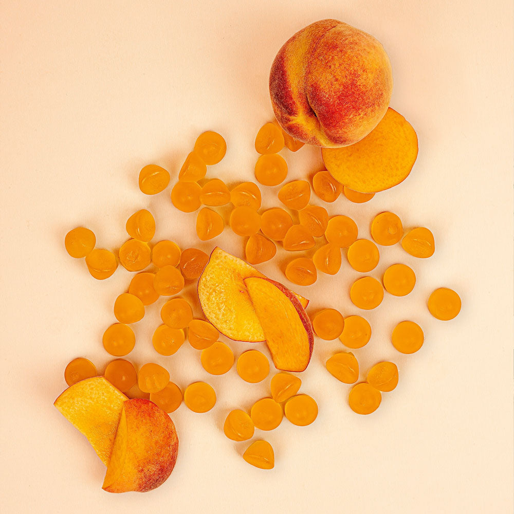 Kids Gummies: Sugar-free multivitamin for children in peach flavors.